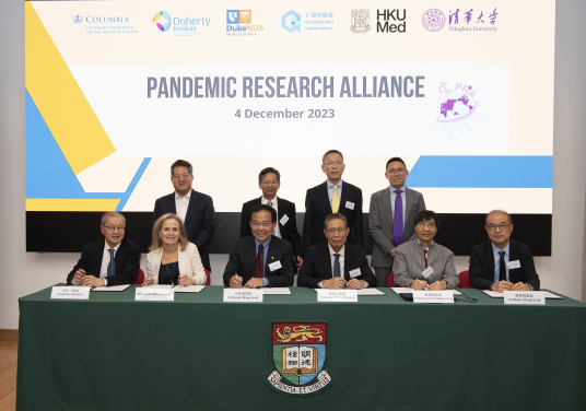 Leading global scientists from six leading institutions in four countries launched the Pandemic Research Alliance (PRA) to drive concerted research into respiratory viruses from animals to humans, improved surveillance, and new solutions to better manage the next pandemic. Joining the signing ceremony were: (front row, from left) Professor David Ho from Columbia University Irving Medical Center; Professor Sharon Lewin, Doherty Institute – University of Melbourne; Professor Wang Linfa, Duke-NUS Medical School; Professor Zhong Nanshan, Guangzhou National Laboratory; Professor Yuen Kwok-Yung, the University of Hong Kong (HKU); and Professor Zhang Linqi, Tsinghua University; witnessed by (back row, from left) Professor Roger Wu, Columbia University Irving Medical Center; Professor Chen Xinwen, Deputy Director, Guangzhou National Laboratory; Professor Chak-sing Lau, Dean of Medicine, HKU; and Mr Sim Zhimin, Director (International Partnerships and Strategy), Tsinghua Medicine, Tsinghua University.
